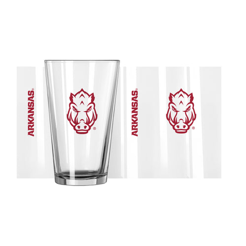 Arkansas 16oz Gameday Pint Glass with team logo, clear glass drinkware perfect for game day celebrations.