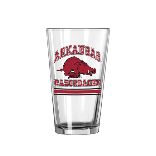 Arkansas Vault 16oz Archway pint glass with Arkansas logo and design, made of clear glass for drinking beverages.