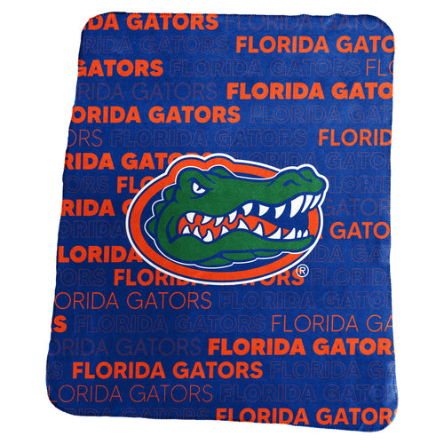 Florida Classic Logo Brands throw blanket with orange and blue design, soft fabric, perfect for cozying up at home.