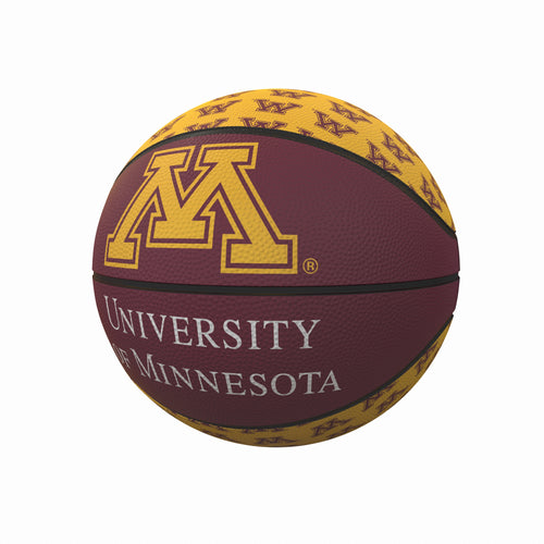 Mini rubber basketball with Minnesota Repeating Logo, designed for recreation and featuring bright team branding.