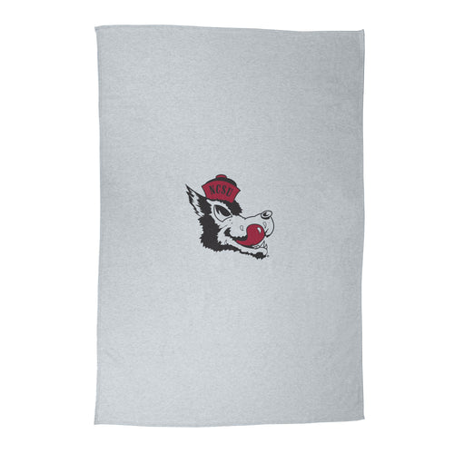 Gray sublimated sweatshirt blanket featuring NC State Vault Athletic logo, made by Logo Brands, displayed folded on a surface.