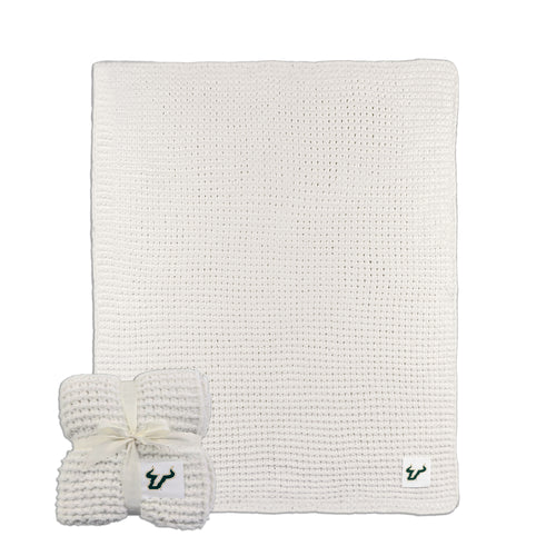 Ivory knit throw blanket from South Florida Cable by Logo Brands, measuring 50x60 inches, soft and cozy for home use