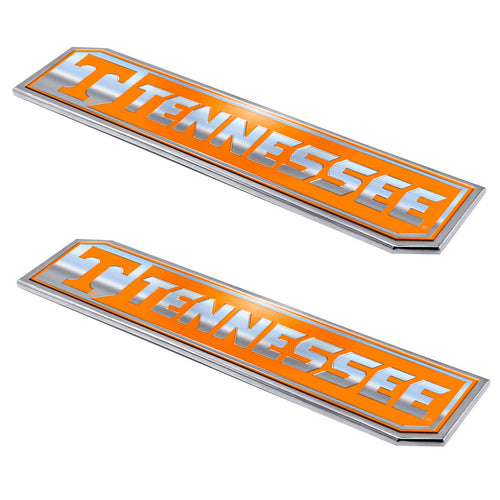 Two University of Tennessee embossed truck emblems by Logo Brands, featuring Tennessee orange and white team logos.