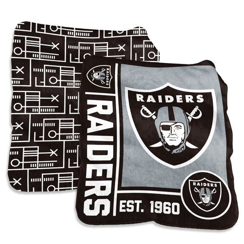 Las Vegas Raiders super plush blanket with team logo, 60x70 inches, soft cozy throw for fans.