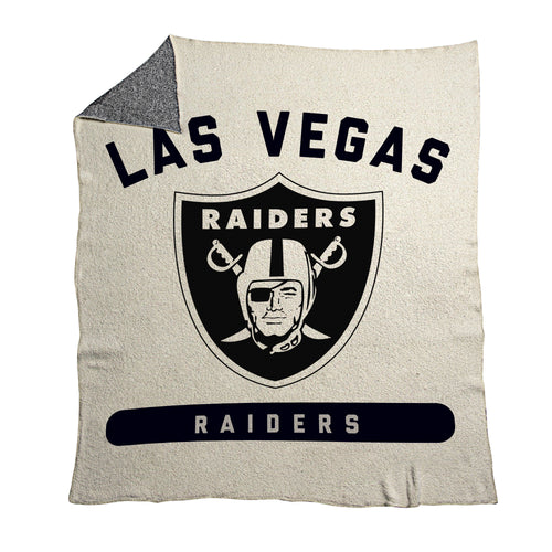 Las Vegas Raiders Prime Luxe Dreams throw blanket with Raiders logo in navy and white, cozy and soft for fans.