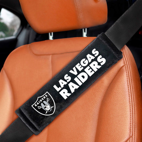 Pair of NFL Las Vegas Raiders embroidered auto seat belt pads by Logo Brands, featuring team logo and padded comfort.