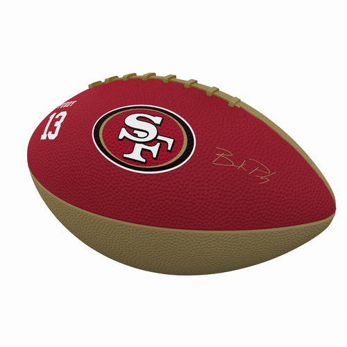 Mini rubber football featuring the San Francisco 49ers Brock Purdy logo and team colors, ideal for recreation and display.