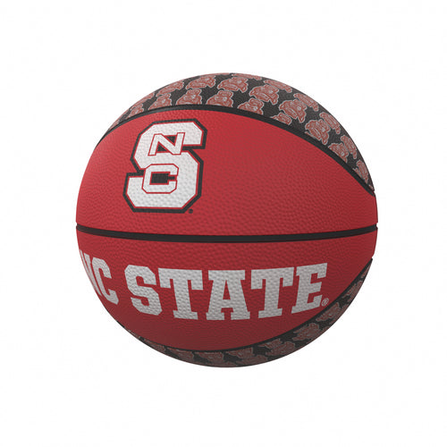 Mini rubber basketball featuring NC State repeating logo, ideal for recreation and sports activities by Logo Brands.