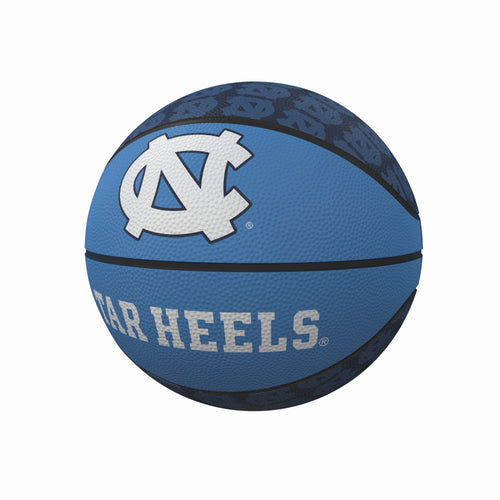 North Carolina Repeating Logo mini rubber basketball by Logo Brands, perfect for recreation and casual play.